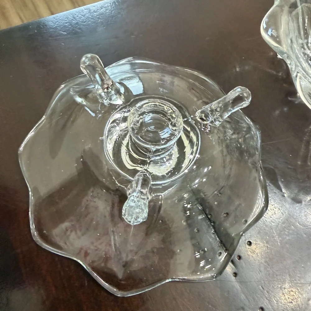 Vintage Art Glass 3-Toed Candle Holder with flower-like scalloped edge.